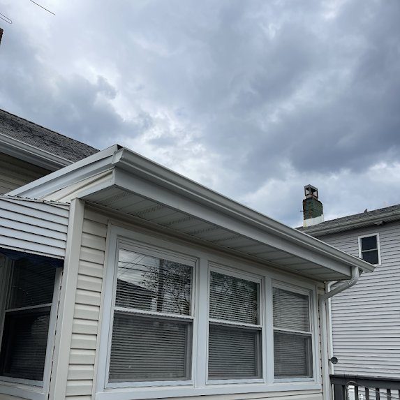 Bay window detail — clean gutter line above the windows