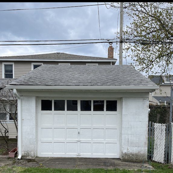 Detached garage — gutters added to match the main house