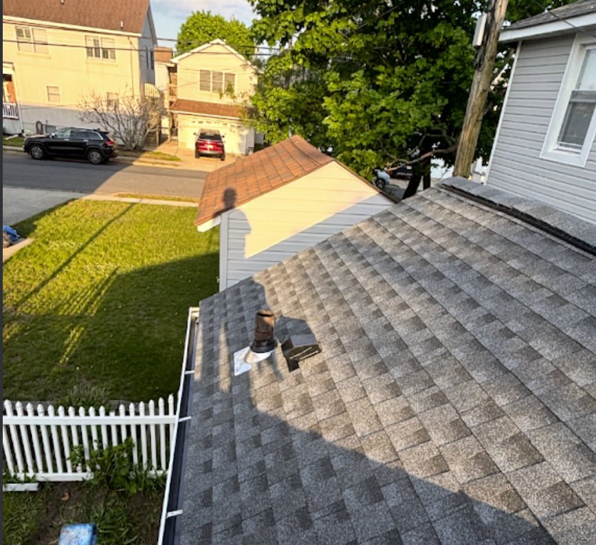 Completed gray architectural shingle roof in Bradley Beach