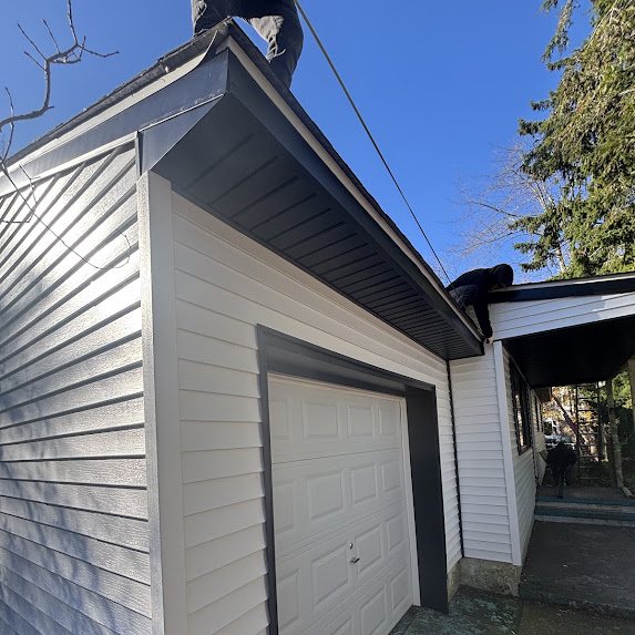 Brick New Construction: Black 5-Inch Gutters and 2x3 Downspouts for a Sharp, Finished Look