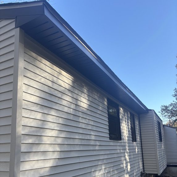 Brick New Construction: Black 5-Inch Gutters and 2x3 Downspouts for a Sharp, Finished Look