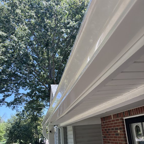 New white 6-inch K-style gutter line on a Freehold NJ home