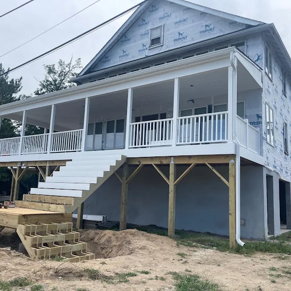 Back in Manasquan: White 6-Inch K-Style on a New Shore Build With a Deck Drainage Challenge