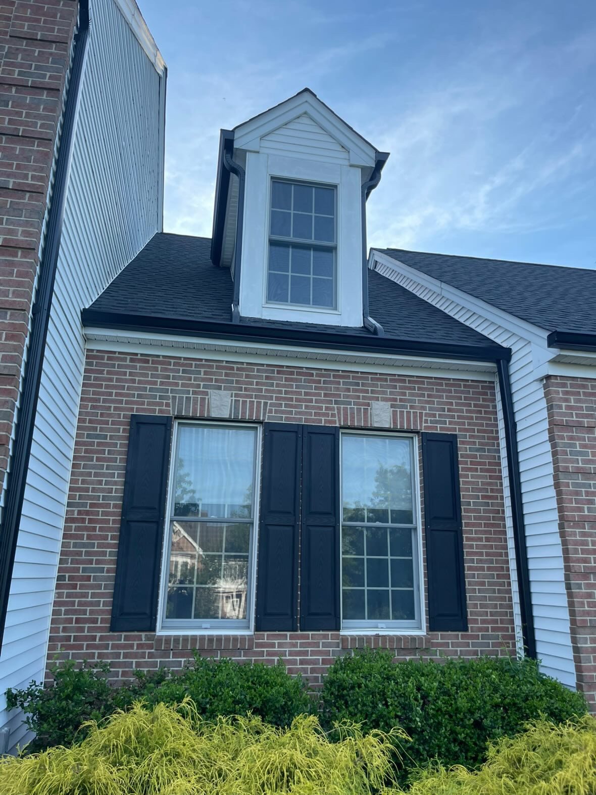Black gutter detail at a dormer on a Millstone Township colonial