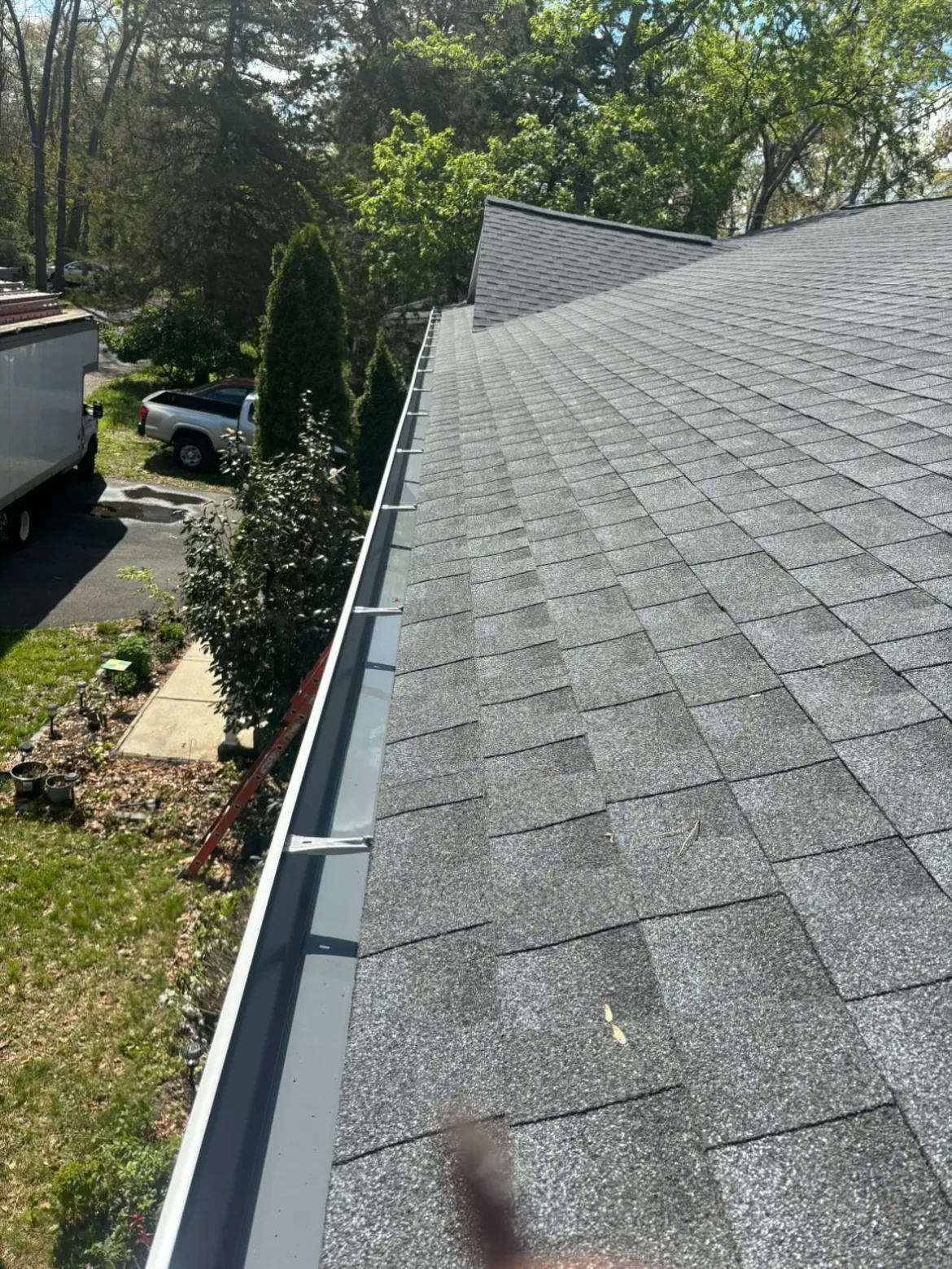 Monmouth County Gutter Work: A Clean White Line Under a Gray Roof