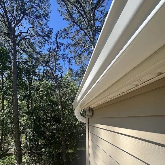 New 5-inch white K-style gutter and 2x3 downspout detail