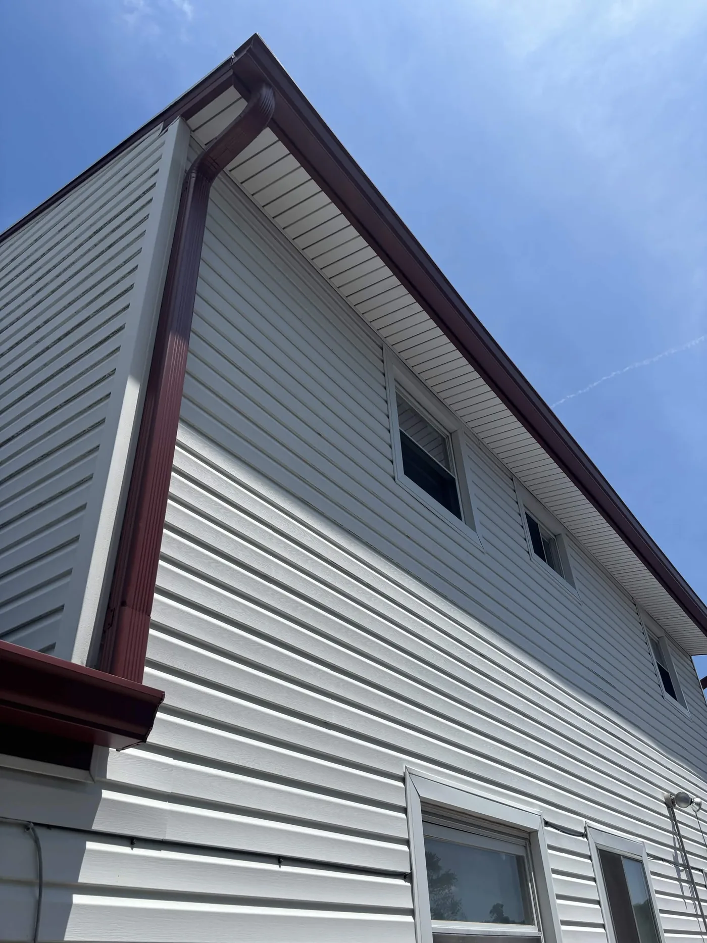 Old Bridge Gutter Install: 6-Inch Scotch Red Seamless Gutters on a Two-Story Colonial