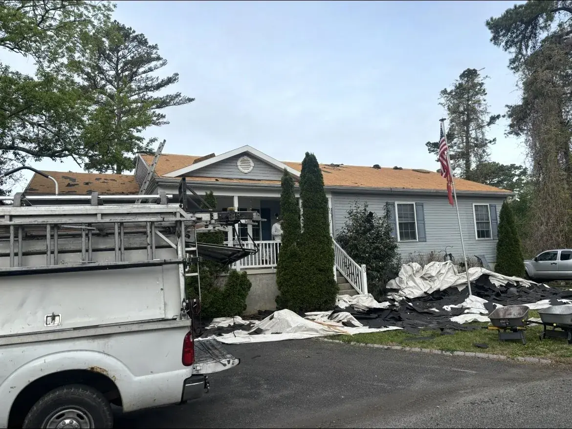 Roof tear-off in progress