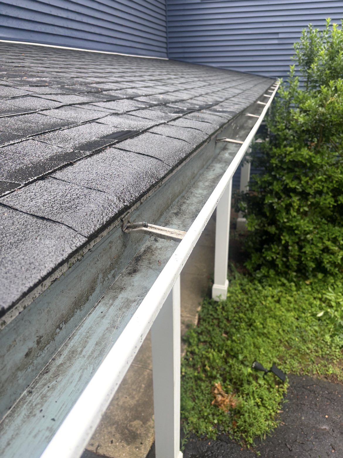 Cleaned empty gutter along a porch roofline in Roosevelt NJ