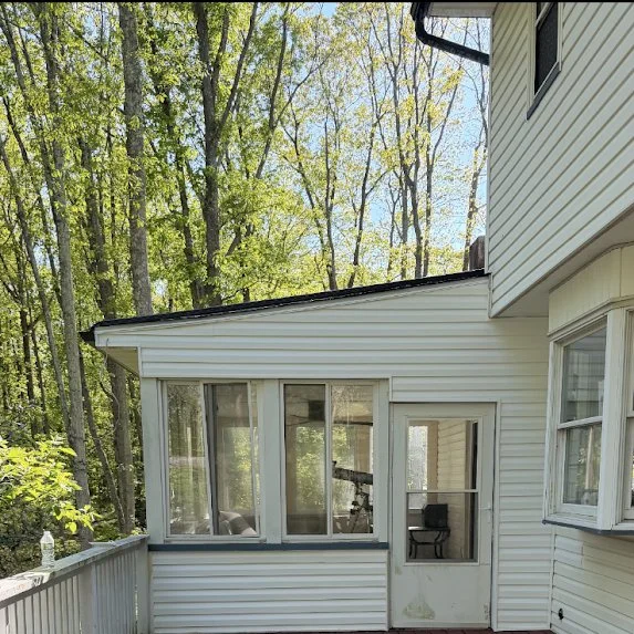 Siding replacement on Millstone Township sunroom — before and after