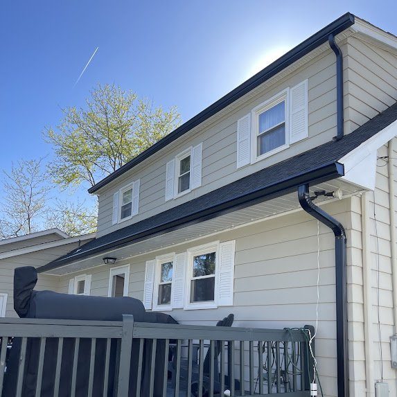 Two-story side with hidden hangers fully concealed from view