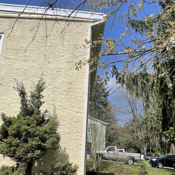 Completed install — clean property, watertight roofline