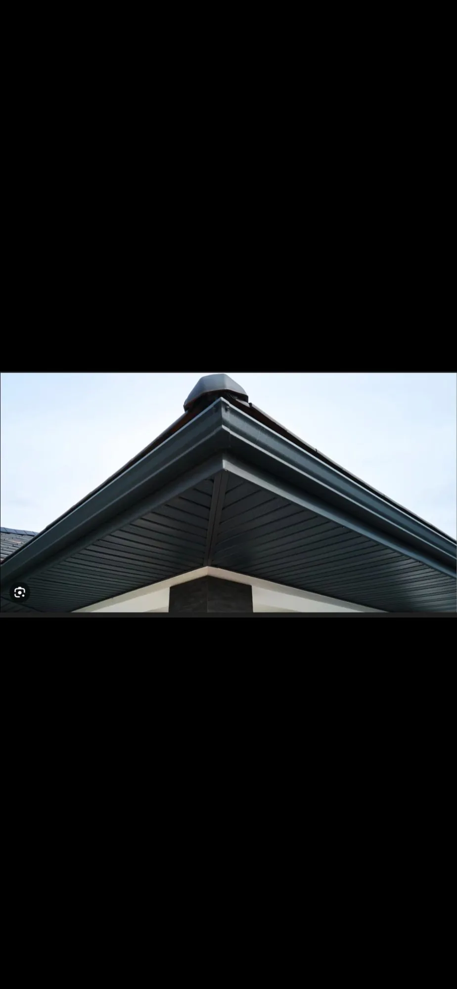 Dark gutters and soffit roof peak
